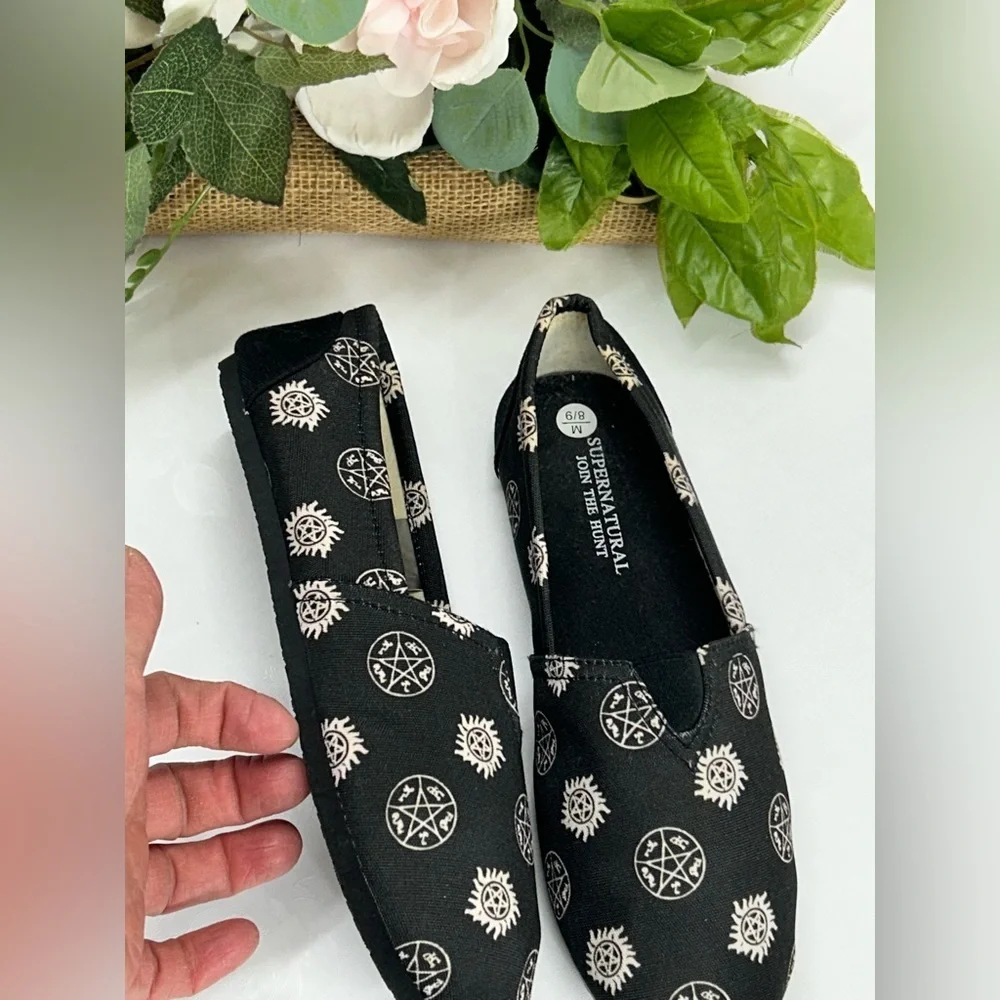 Black Slip-On Shoes with Supernatural Print